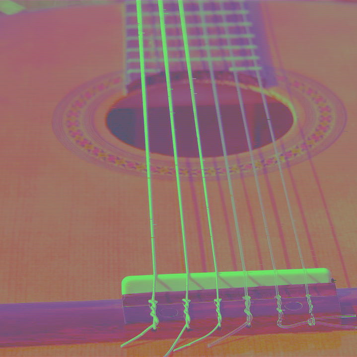 a close-up picture of an acoustic guitar from a low angle with scanlines and a subtle pixel sort filter over top
